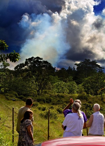 People viewing the smoke rising from Kilauea June 27th lava flow near the Pahoa Transfer Station on Cemetary Road Saturday (Sept 13).  According to the USGS/HVO the spot where I shot this from will be flowed-over in the coming weeks should the lava continue. Photography by Baron Sekiya | Hawaii 24/7