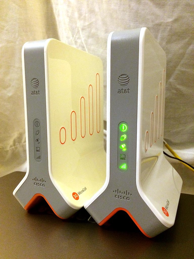 A pair of AT&T first generation MicroCells. The one on the right is activated.